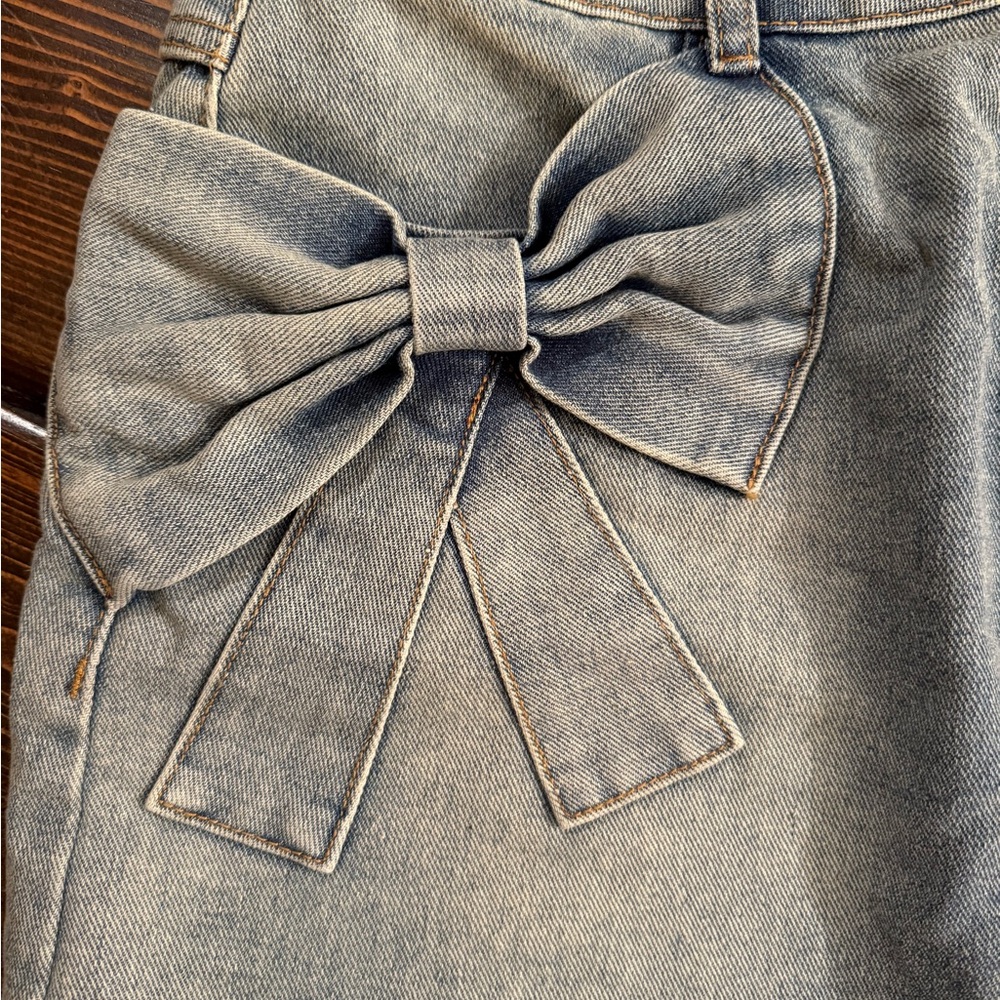 Denim Mini Skirt with Bow Accents - Picture 2 of 3
